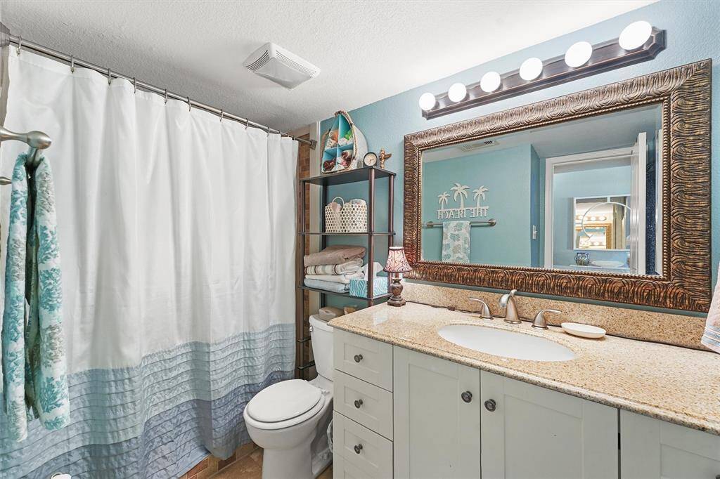 Bathroom with large walk-in tile shower
