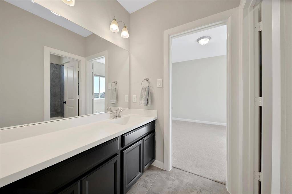 View of secondary full bathroom.