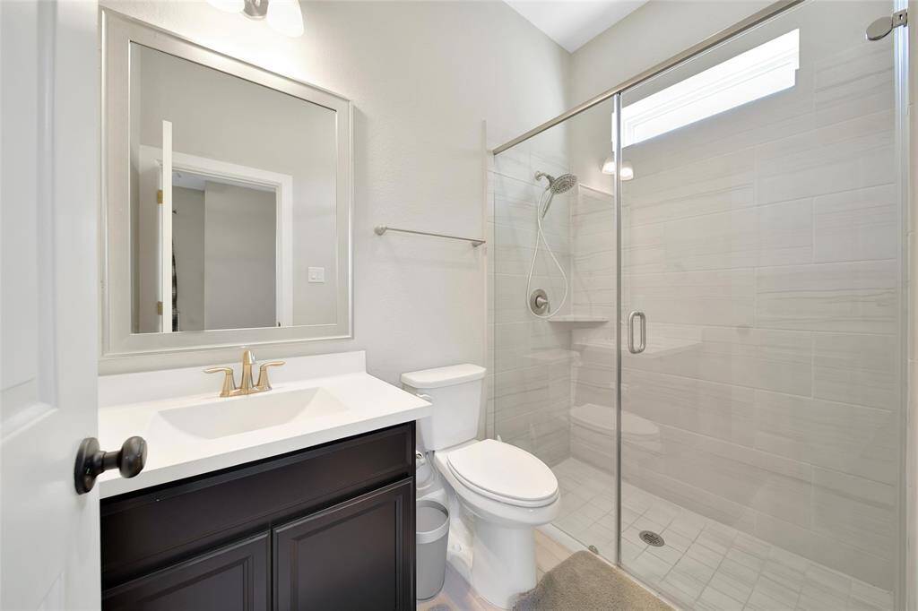 View of secondary half bathroom.