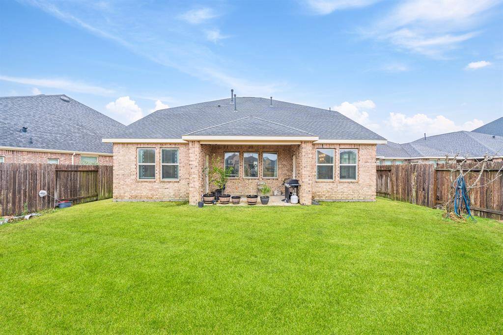 Spacious Backyard with covered Patio