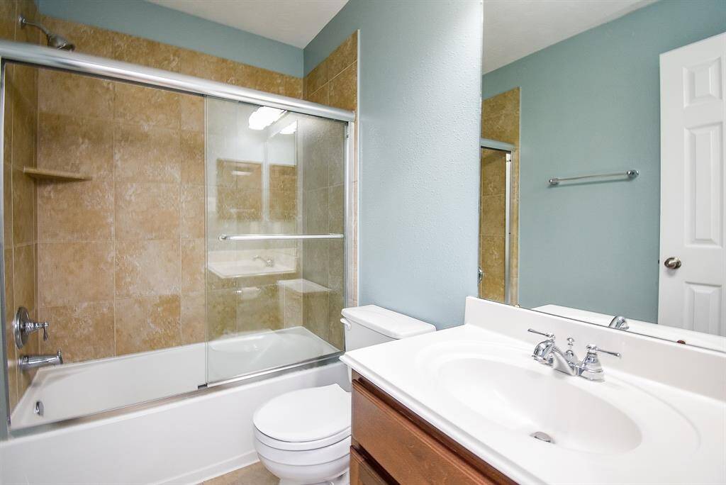 Secondary bath located at the top of the stairs can be easily accessed by the game room or guest bedroom.