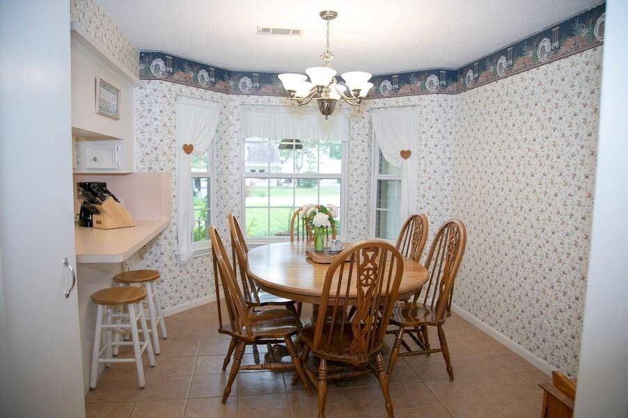 Dining area located at front of home.