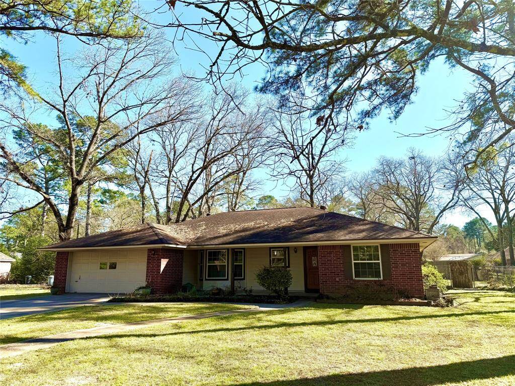 Front of home from Northwest showing sides of yard