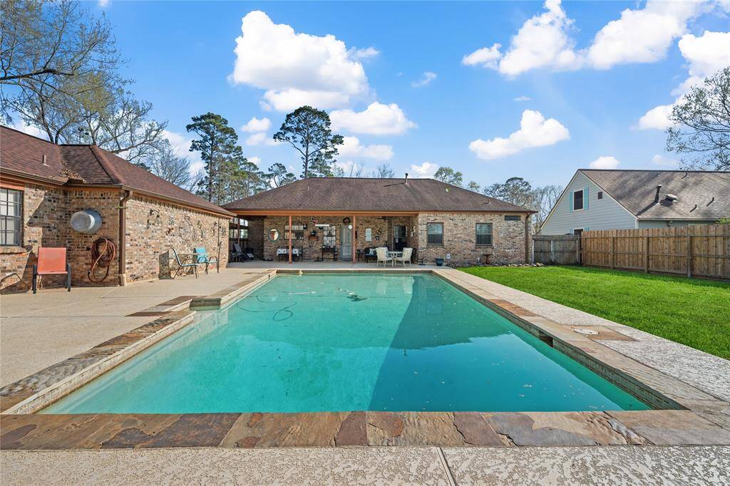 Welcome to 135 Deer Lake! With a guest house, plenty of room in the main home, a pool and lake views, the possibilities are LIMITLESS!