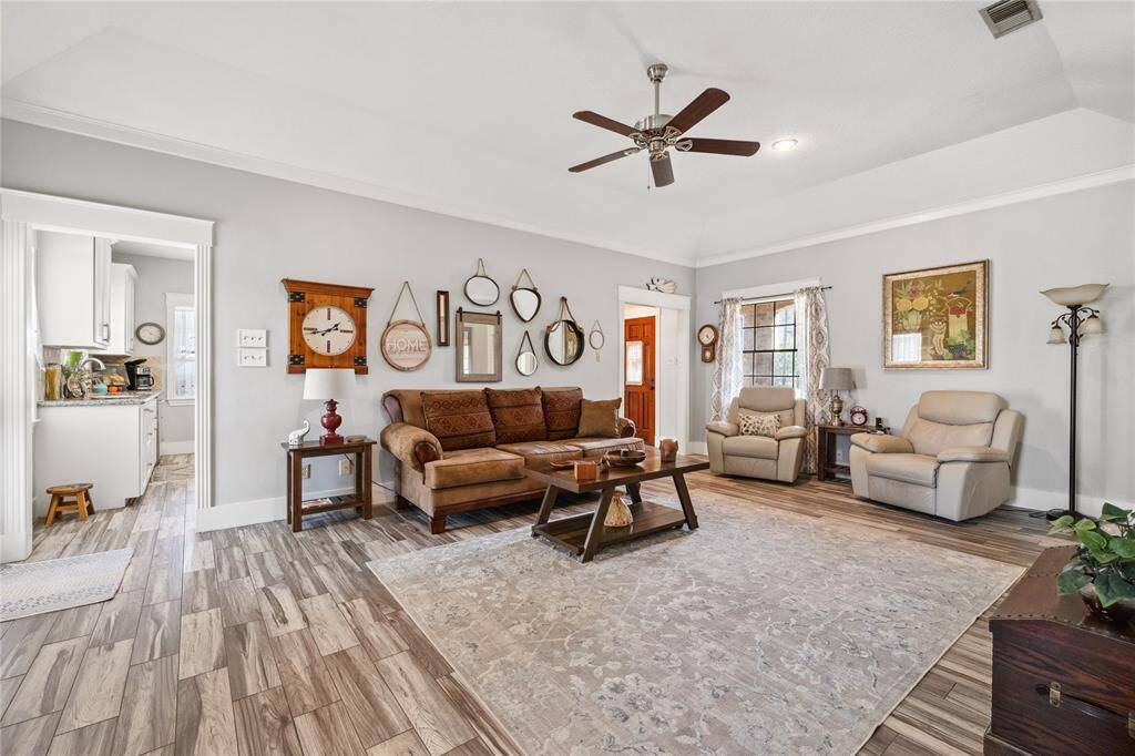 With coffered ceilings, crown molding, higher baseboards, and door frame molding throughout, you'll see the love at every turn!