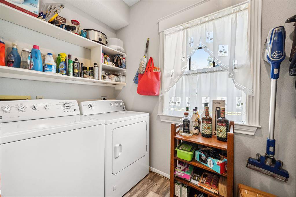 The laundry room is spacious and just off the kitchen for your convenience!