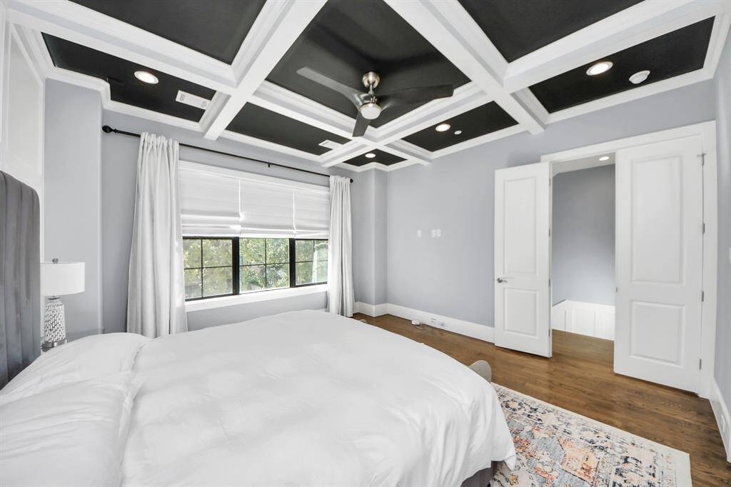 Another perspective unveils a comprehensive view of the serenity and comfort this primary suite offers.