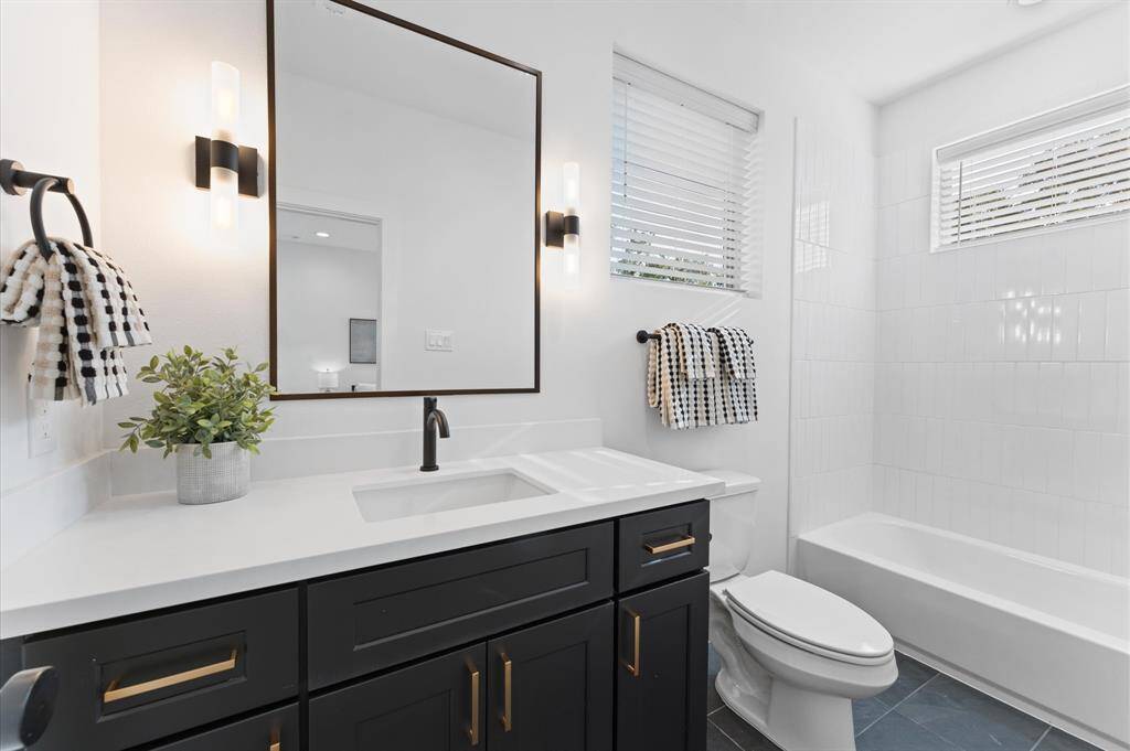 Photos are from a previous NJA Homes development. Floor plan, finishes & specifications may vary.