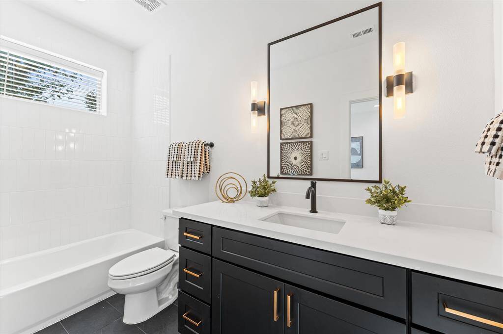 Photos are from a previous NJA Homes development. Floor plan, finishes & specifications may vary.