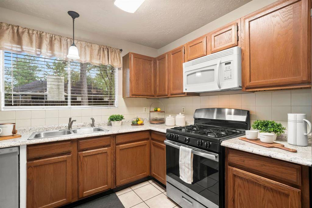 Kitchen overlooks the lovely backyard