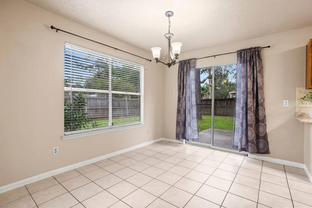 Two sets of windows to enjoy in the spacious dining area