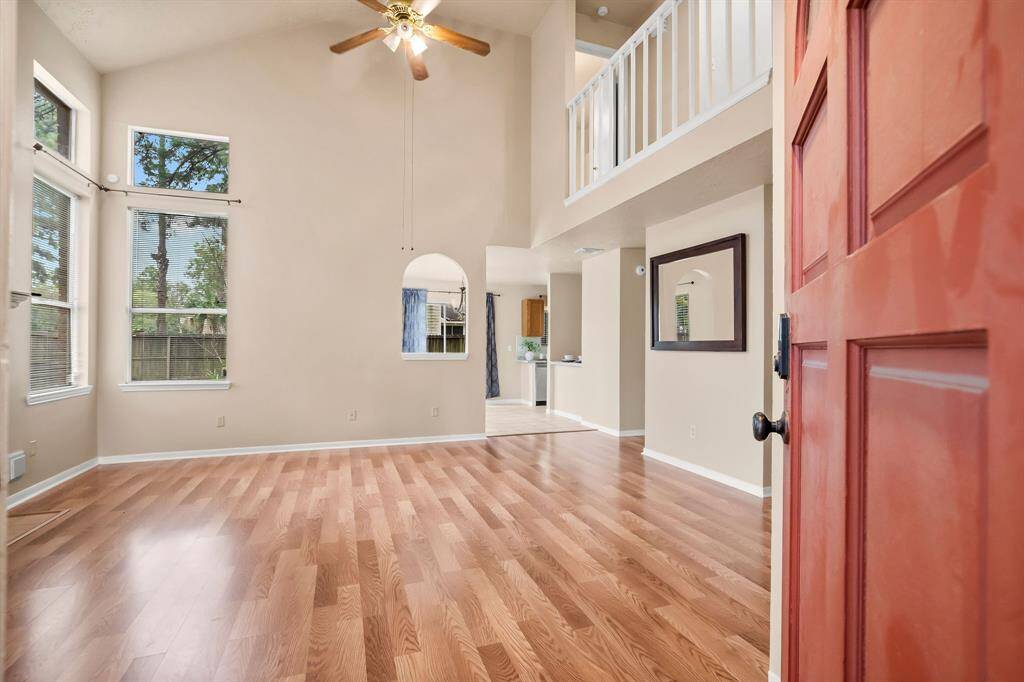 Entry opens to two-story family room