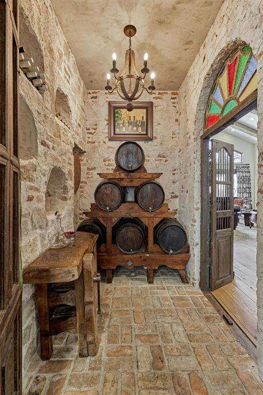 Wine room with antique French wine barrels.