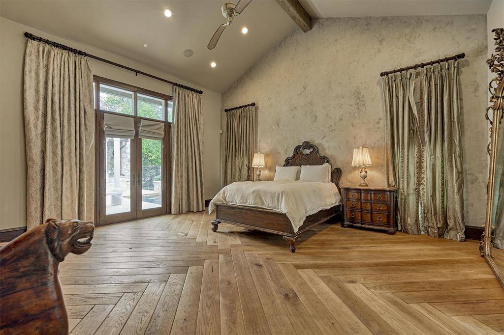 Expansive primary retreat, entered through 17th century doors from Como, Italy (not shown)  is a peaceful sanctuary, designed for ultimate comfort and elegance.