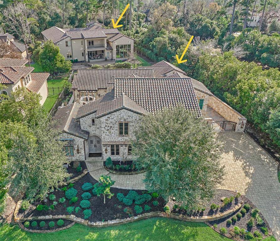 A rare opportunity awaits to own two homes back to back, behind the gates of Carlton Woods Creekside. The sellers have homesteaded two lots with both homes under one address. They would also consider selling them separately.