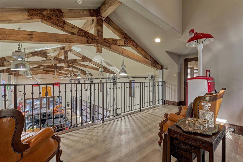 Upper level lounge provides the perfect vantage point for admiring the automotive treasures.