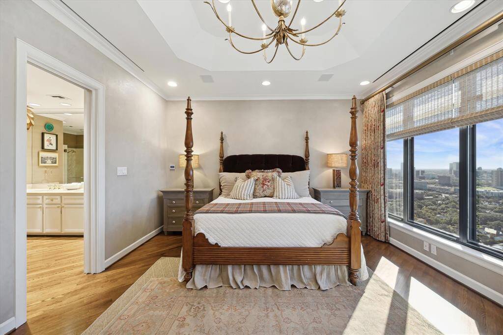 Linear air vents and two HVAC units provide discreet temperature control throughout the home.