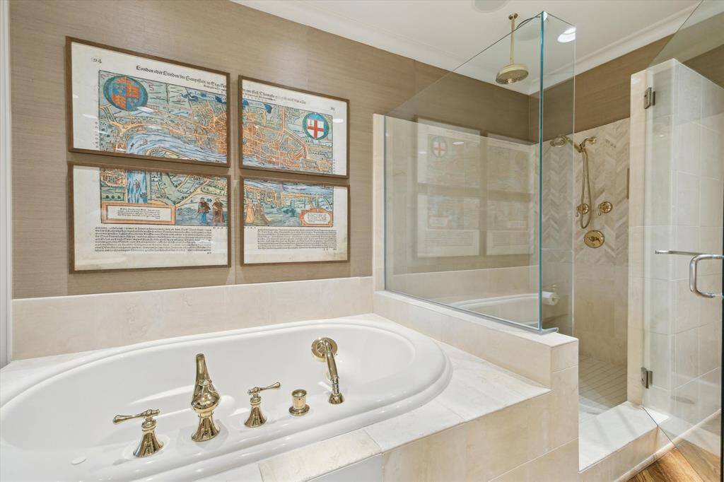 Soak in the oversized jetted tub or enjoy a walk-in rain shower with bench seating and a separate hand sprayer.