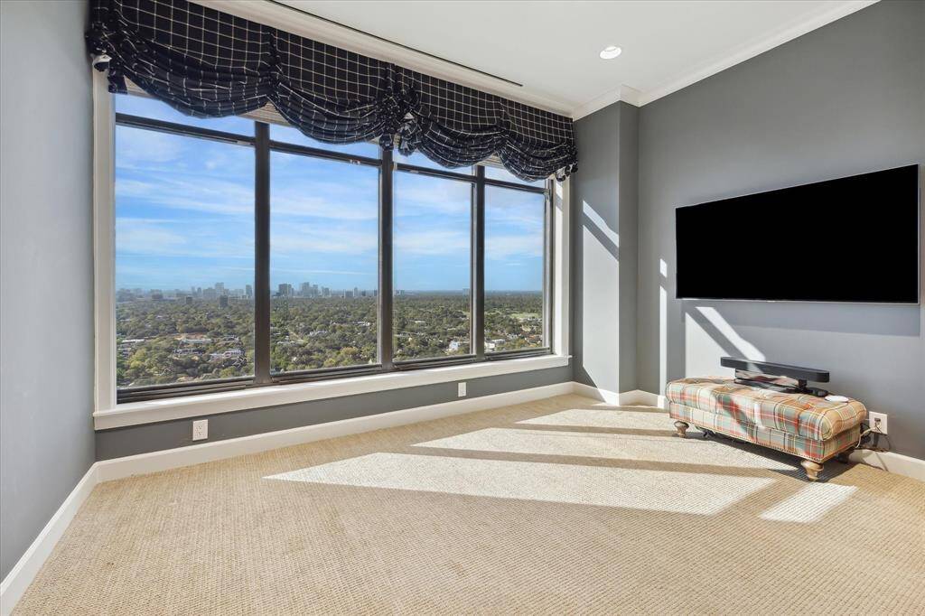 Two large secondary suites with luxurious carpeting, stunning views, roomy closets and en suite baths provide comfortable accommodations for friends and family.