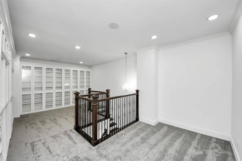 The second floor of this custom 15'9" x 14'2" walk-in closet offers plentiful space for all of your needs, and remember there's also another separate 18' x 7'5" custom walk-in closet as well!