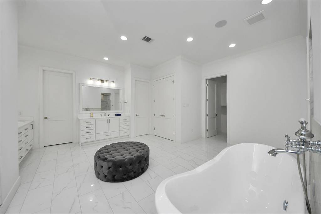 Another view of the incredible primary ensuite bathroom...this room also features surround sound, so you can enjoy your favorite music while getting ready for your day or winding down from one!