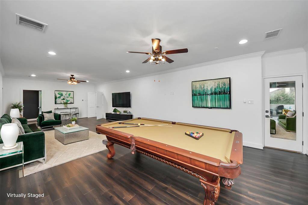 The huge 36'5" x 15'9" game room is large enough for a full-size pool table plus offers plenty of extra seating room to watch the big games, and has direct upper-balcony access to bring the party outdoors!