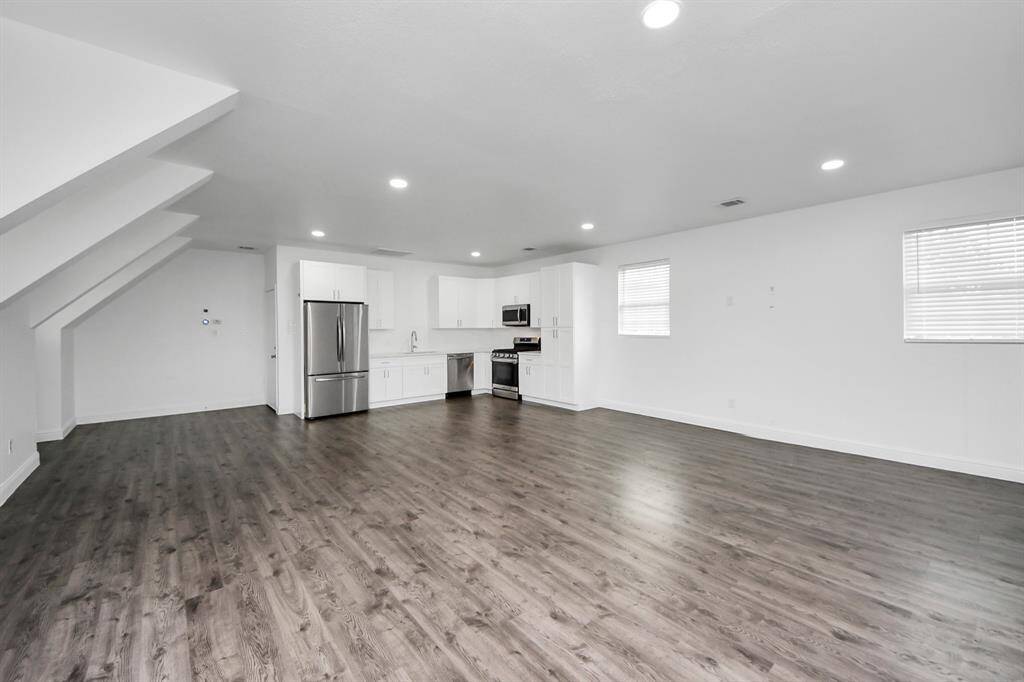 The separate garage apartment is 1,269 square feet and features a large, open living space with a fully equipped kitchen - and also boasts a whole-home dehumidifier!