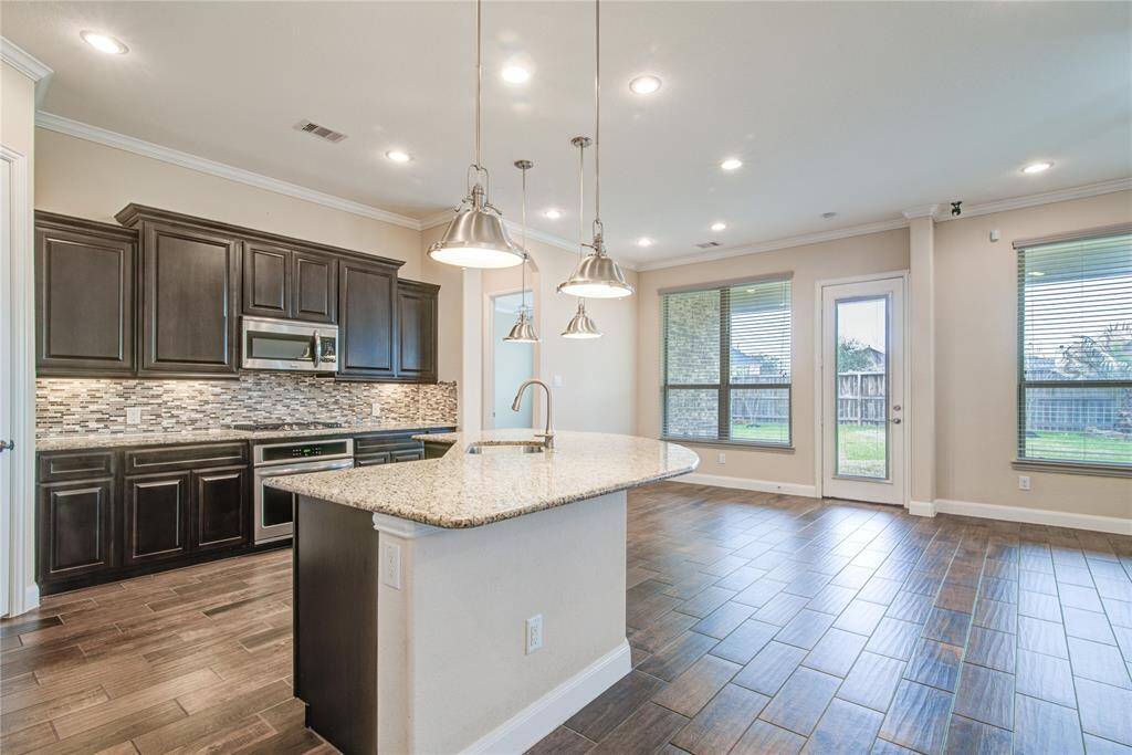 Another view of the kitchen island with the deep sink.