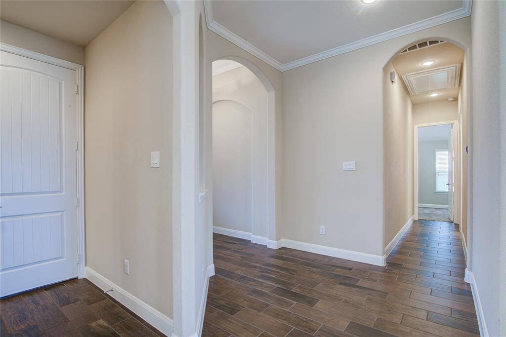 The garage entry is shown to the left, at the start of the hall that has the mud bench and utility room.