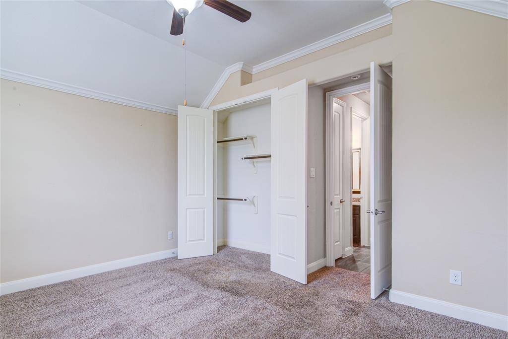 The reverse view of bedroom 4 shows the closet and proximity to the bathroom on the hall.