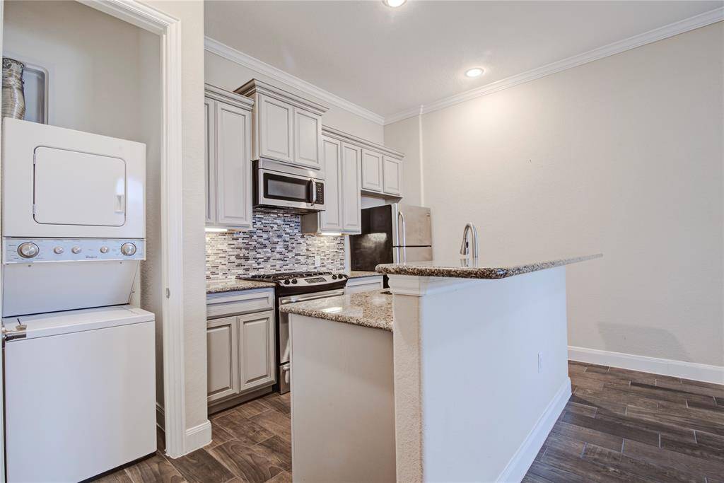 The stackable washer and dryer make this a truly self-contained apartment with everything one would need.