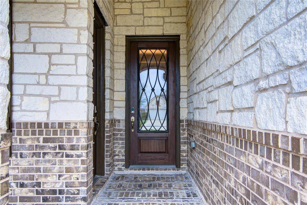 The front porch welcomes your guests to both front doors for the home.