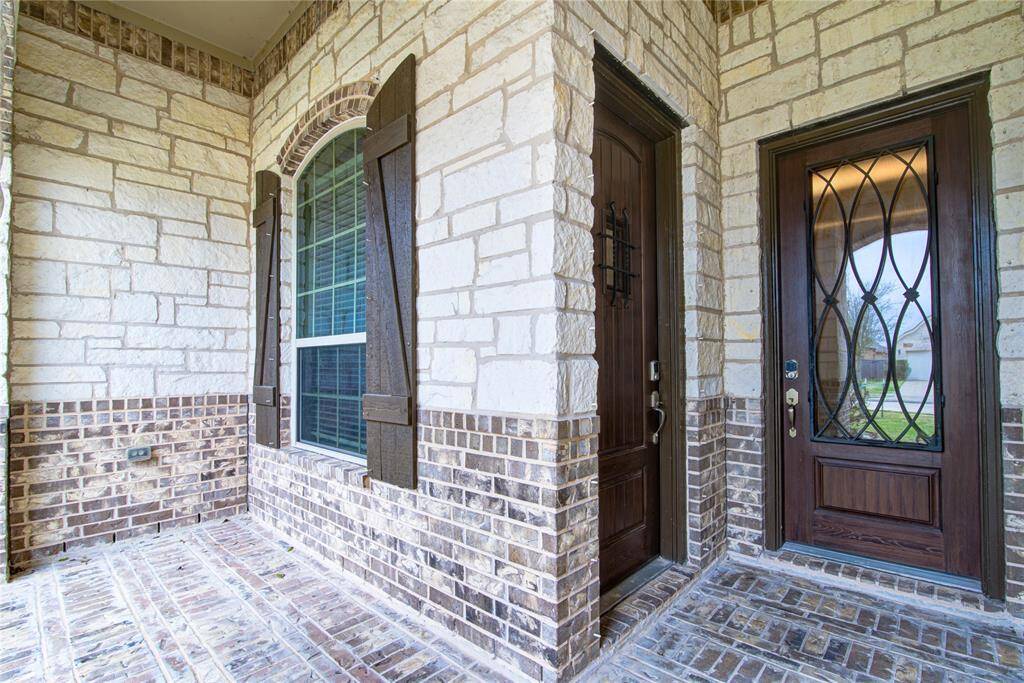 The door straight ahead is to the main house and the door to the left is for the separate apartment space.