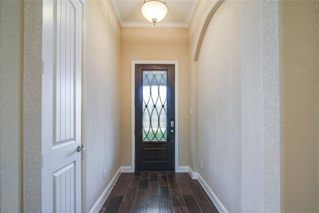 You enter the main house into an elegant foyer with a convenient coat closet.
