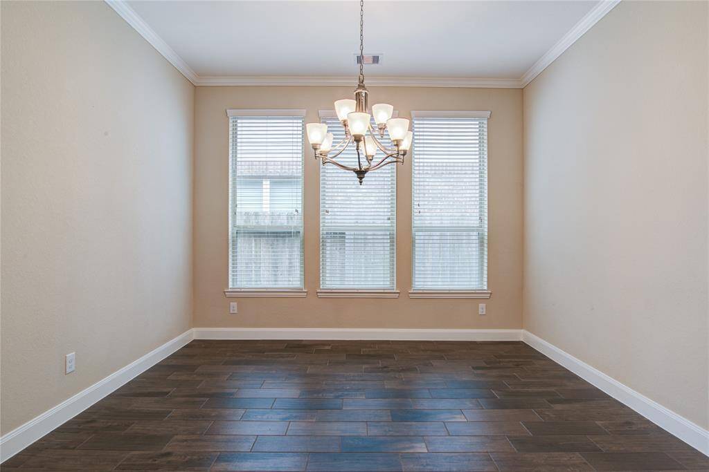 The spacious dining room is convenient to the kitchen but also secluded enough to be used as an office, if desired.