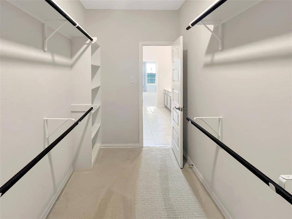 The Robin- Primary Walk-in Closet.