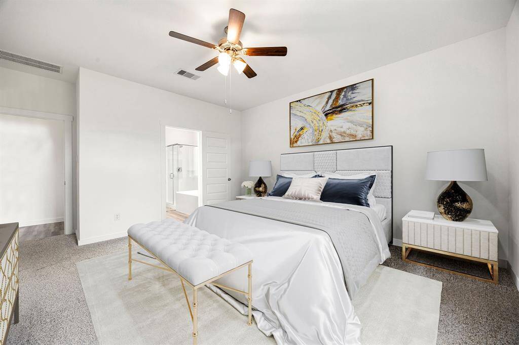 What a wonderful place to come home to, this stunning primary suite greets you with plush carpet floors, high ceiling, ceiling fan with lighting, lovely windows allowing in natural light brightening up this spacious primary bedroom, with extra space for a seating area.