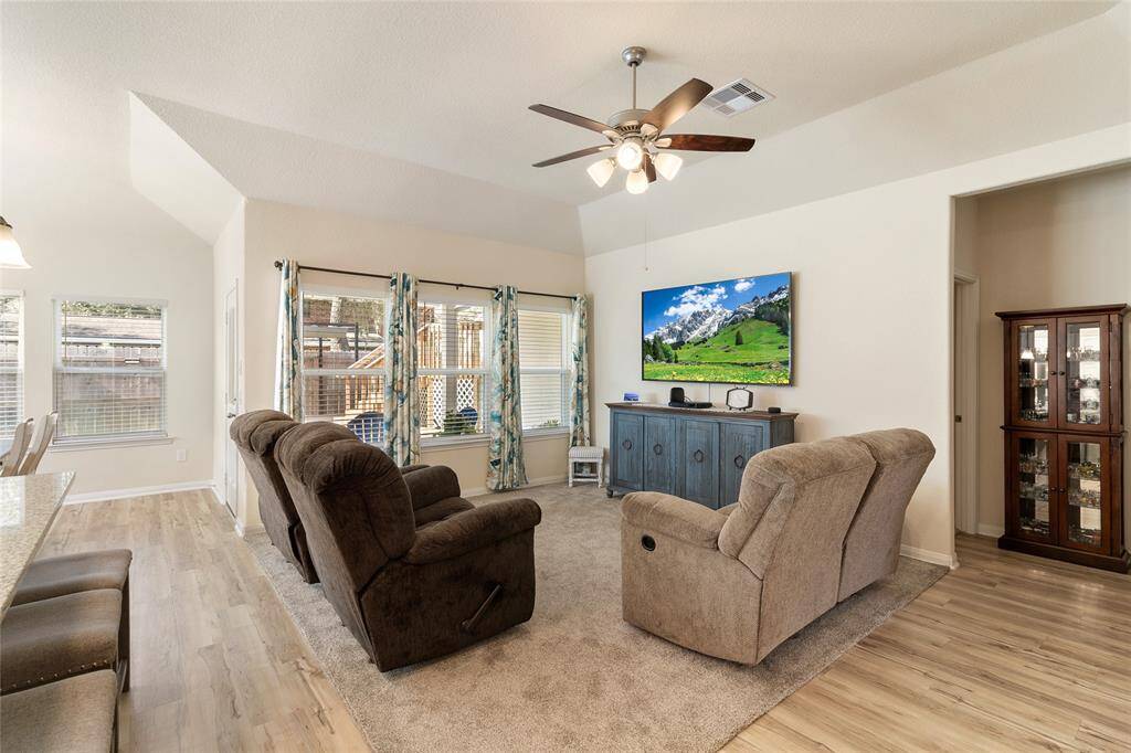 Enjoy the benefits of a split bedroom floor plan, with the primary bedroom conveniently located just off the family room, offering both privacy & easy access to the heart of the home.