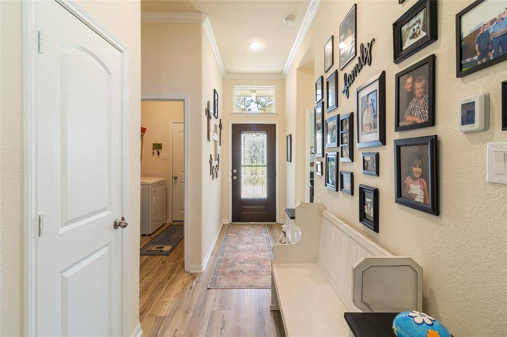The 3 additional bedrooms are conveniently located on the opposite side of the property on either side of the entryway, offering privacy & easy access to the main living areas.