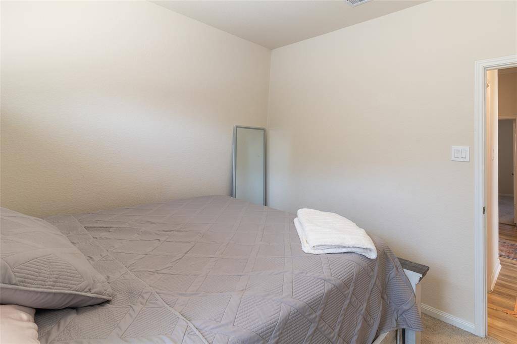 Additional view of Bedroom #2, with the second full bathroom conveniently located adjacent to the space.