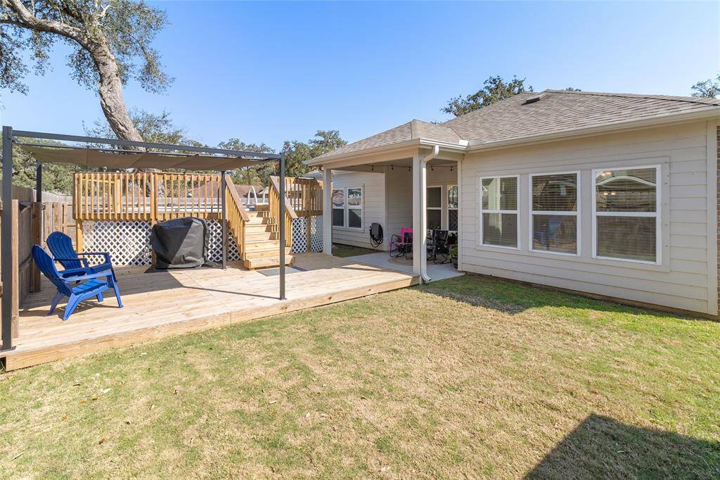 Relax and entertain in style with an above-ground pool surrounded by decking, complemented by two covered patio areas that provide the perfect setting to enjoy the outdoors in comfort.
