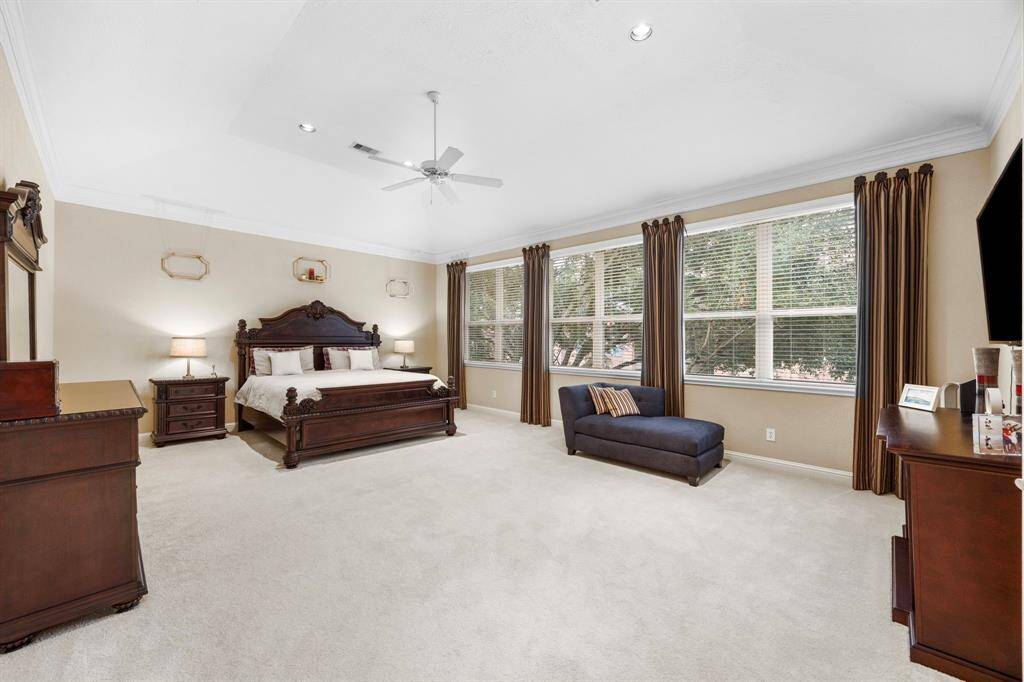 The master suite on this home is the star of the show. At 26' x 20' this is unbelievable space filled with natural light from the huge windows.