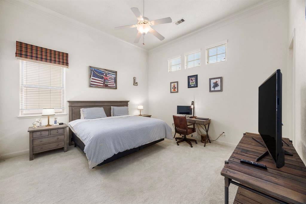 Secondary bedroom #1 offers high ceilings, a huge walk in closet and its on en-suite bath.