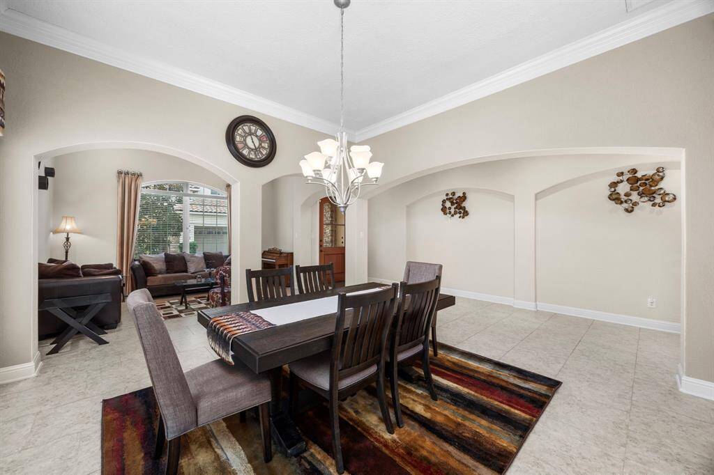 Another look at the dining room that showcases the ample wall space in the entry hall.