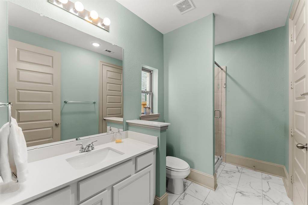 Full bathroom connected to guest suite.
