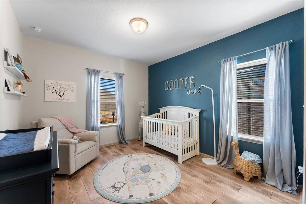 One of three charming upstairs bedroom with convenient Jack and Jill bathroom access.