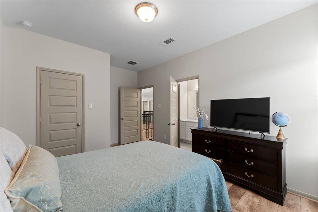 One of three upstairs bedroom with attached Jack and Jill Bath