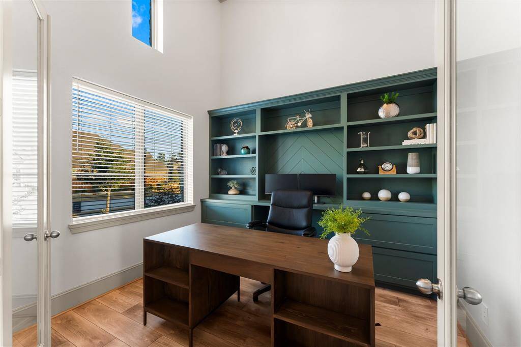 Elegant custom bookshelf enhances the home office.