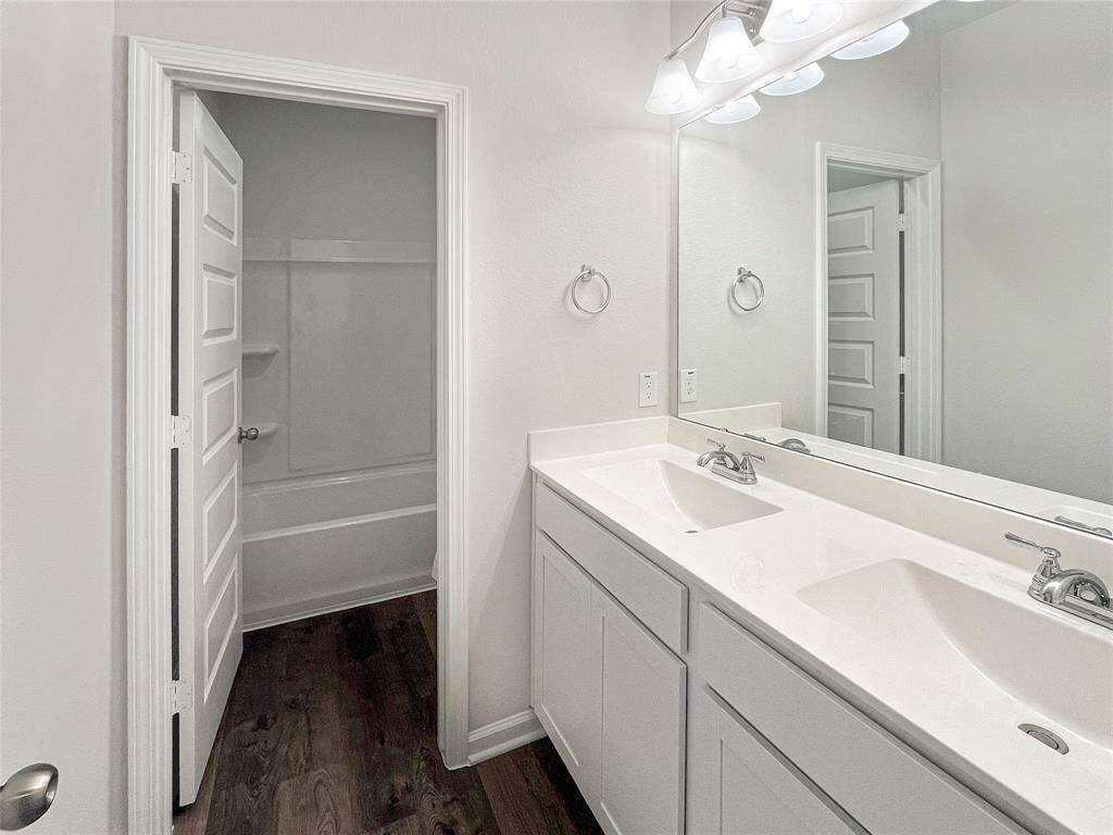 The Sparrow II-Secondary Bathroom with Dual Sinks.