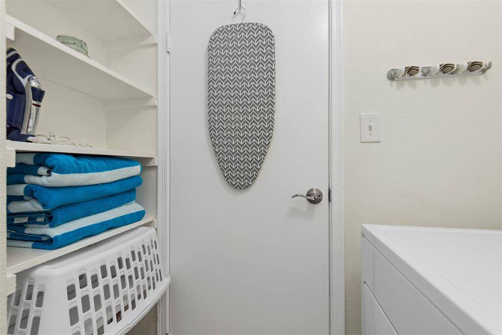 Laundry room closet with tons of storage! Full sized Washer and Dryer included! Nice beach towels included! Ironing is optional at the beach, of course! Casa Aloha has it all!